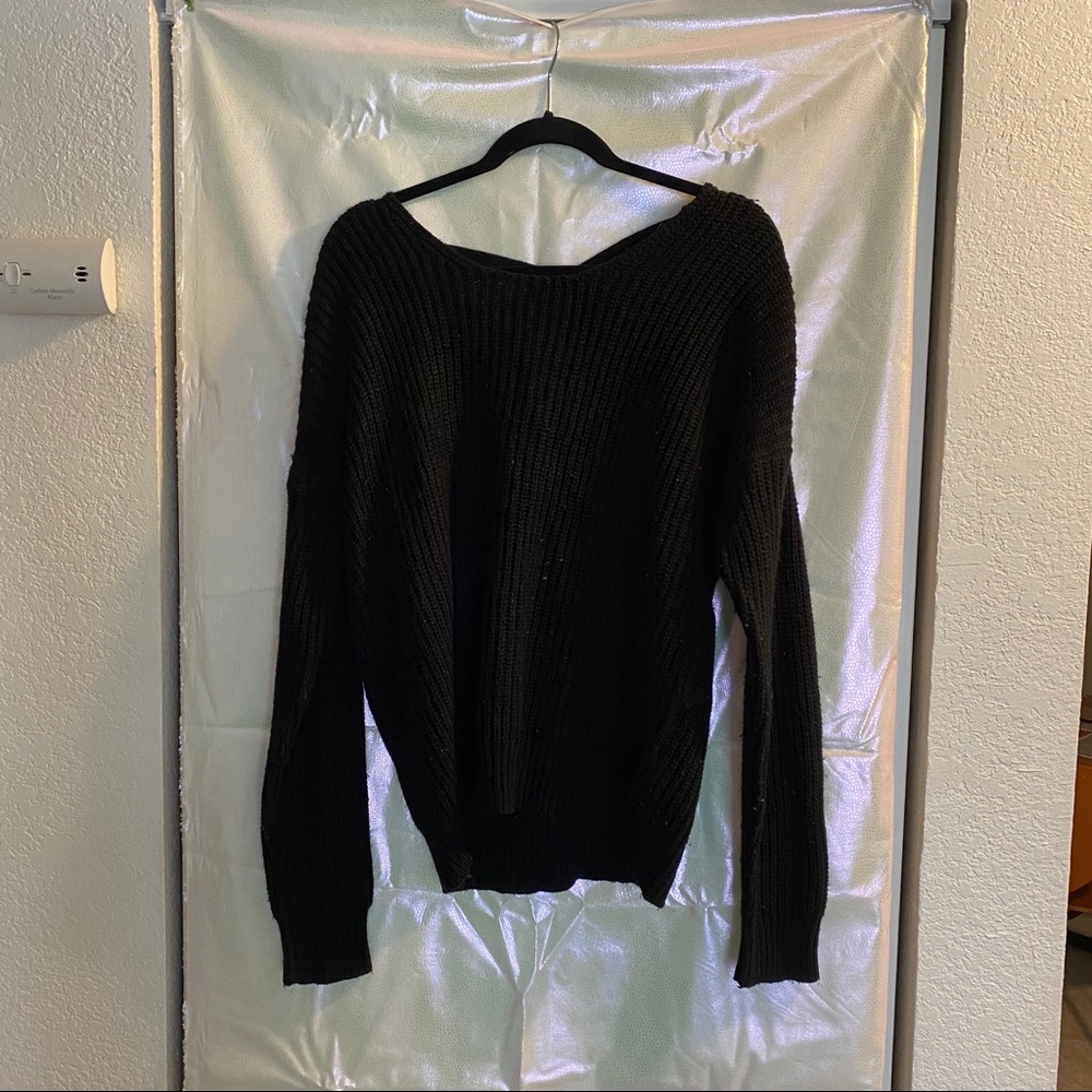 Black sweater with cross cross back